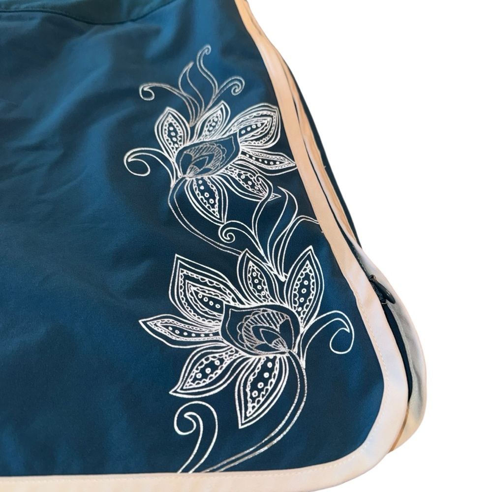 Athleta Teal Athletic Skort Size 4 Floral Trim Mesh Lining Adjustable Vent EUC - Picture 2 of 7
